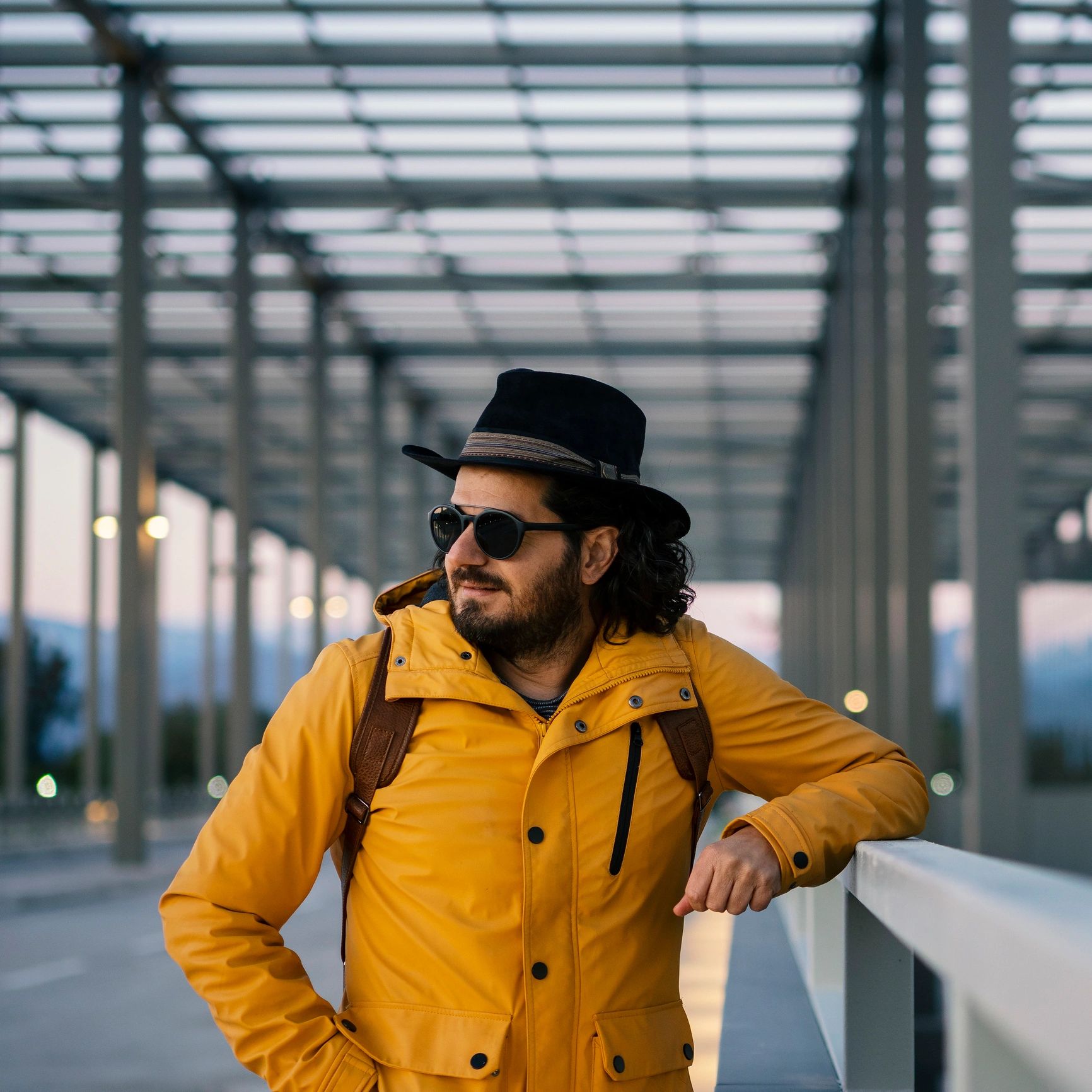 Portrait of a traveler waiting outside an airport