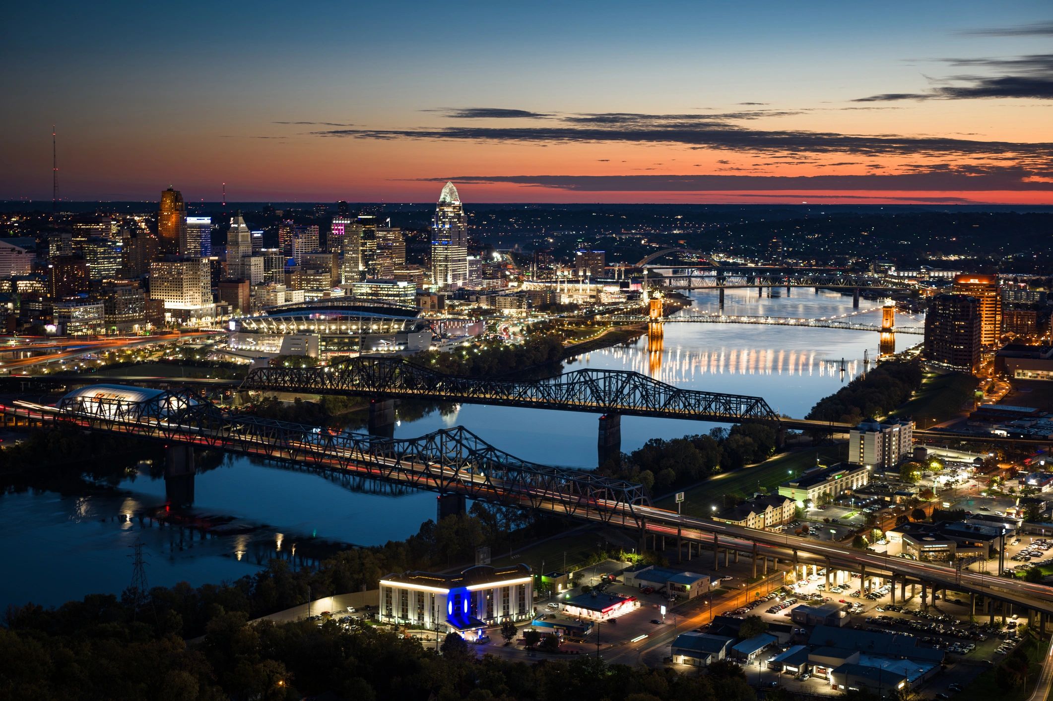 Aerial city skyline at twilight representing destination discovery