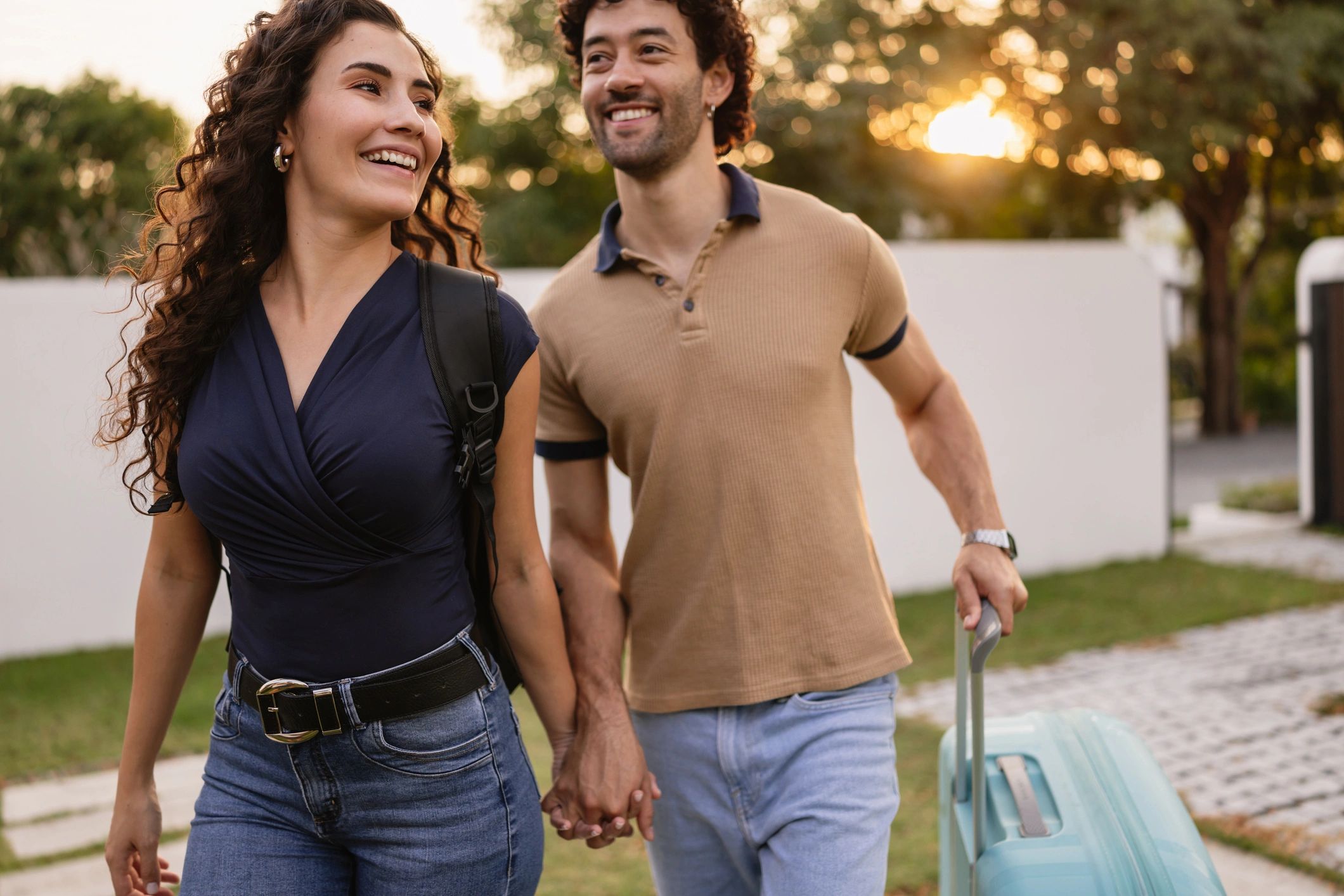 Traveler couple arriving with luggage
